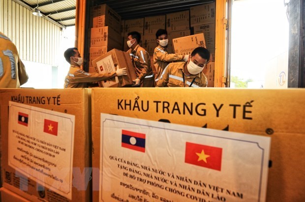 越南向老挝人民捐赠6亿越盾和22 5万只医用口罩
